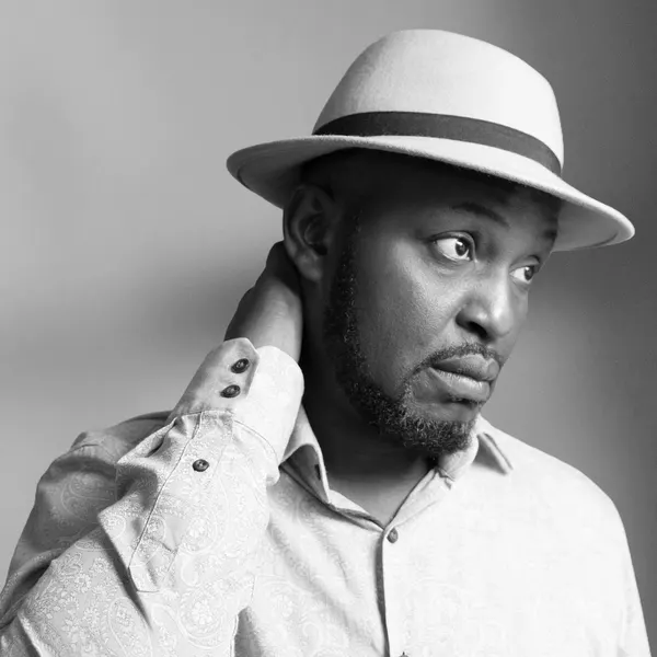 Monochrome portrait of Joseph Opare